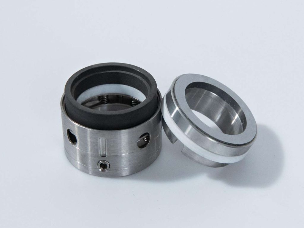 Multi-spring seal head with stationary seat